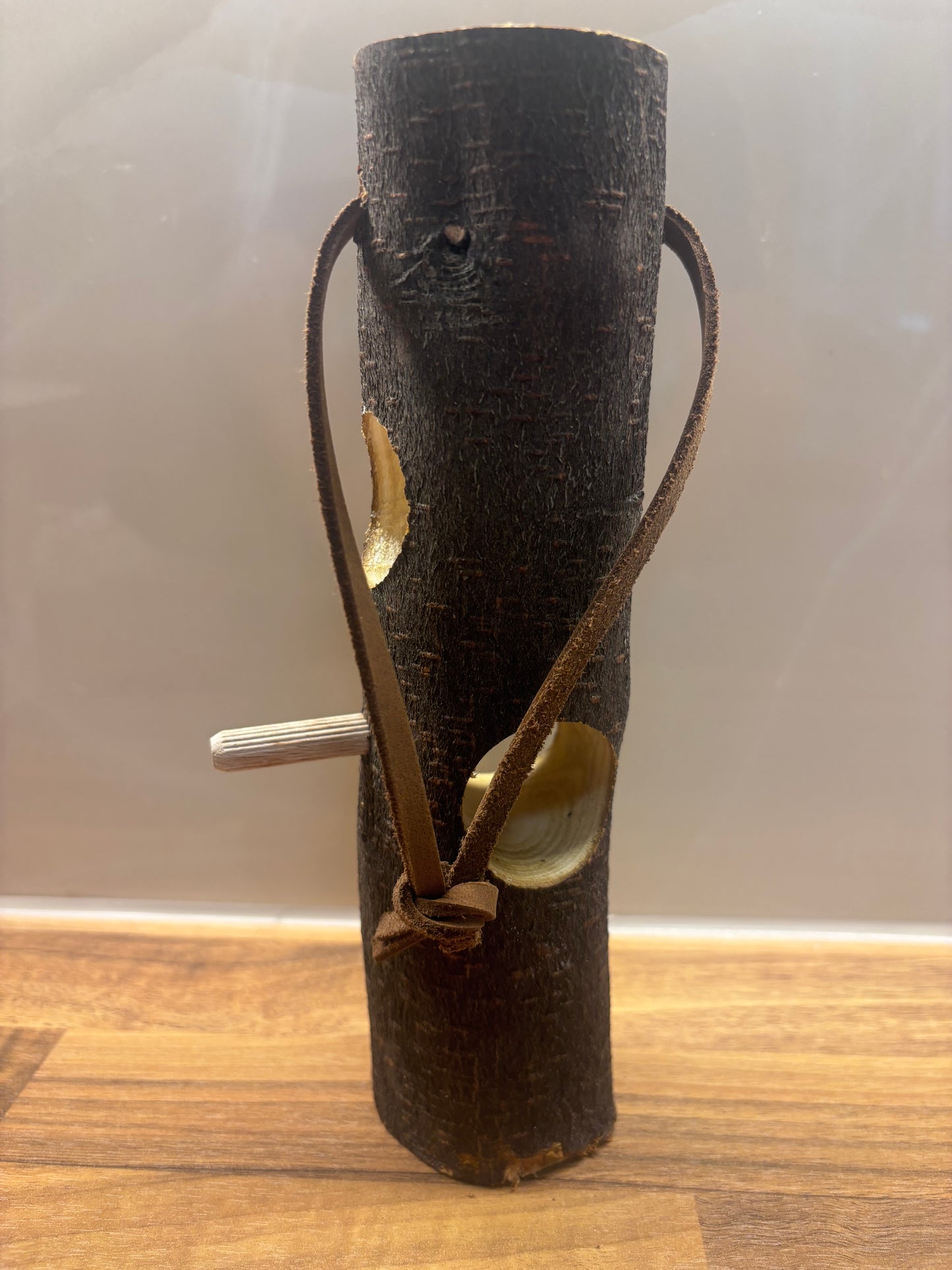 Handmade suet log bird feeder for feeding garden birds in wildlife gardens