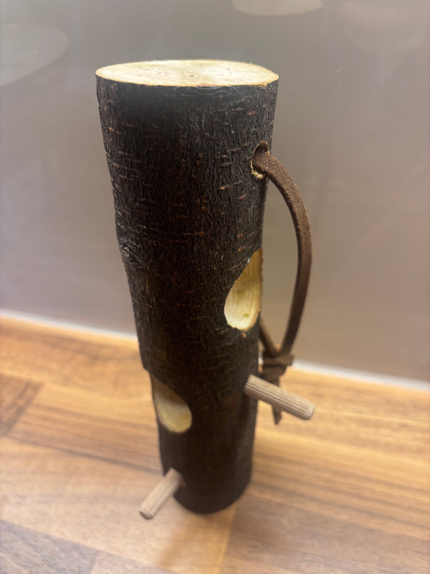 Handmade suet log bird feeder for feeding garden birds in wildlife gardens