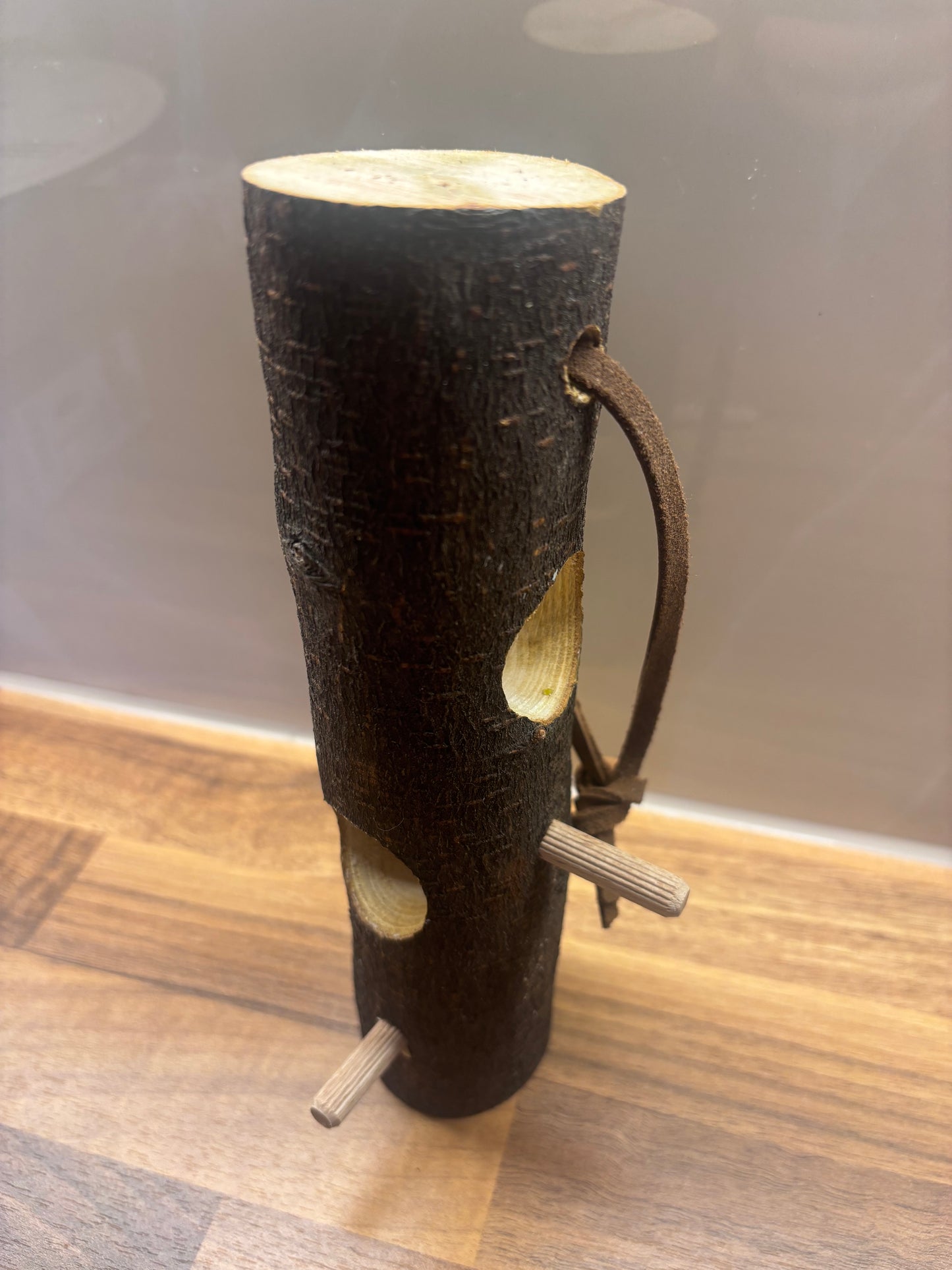 Handmade suet log bird feeder for feeding garden birds in wildlife gardens
